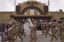 a_british_military_band_plays_during_a_handover_ceremony_of_shat_al-arab_hotel_to_iraqi_authorities_in_basra_3103009.jpg